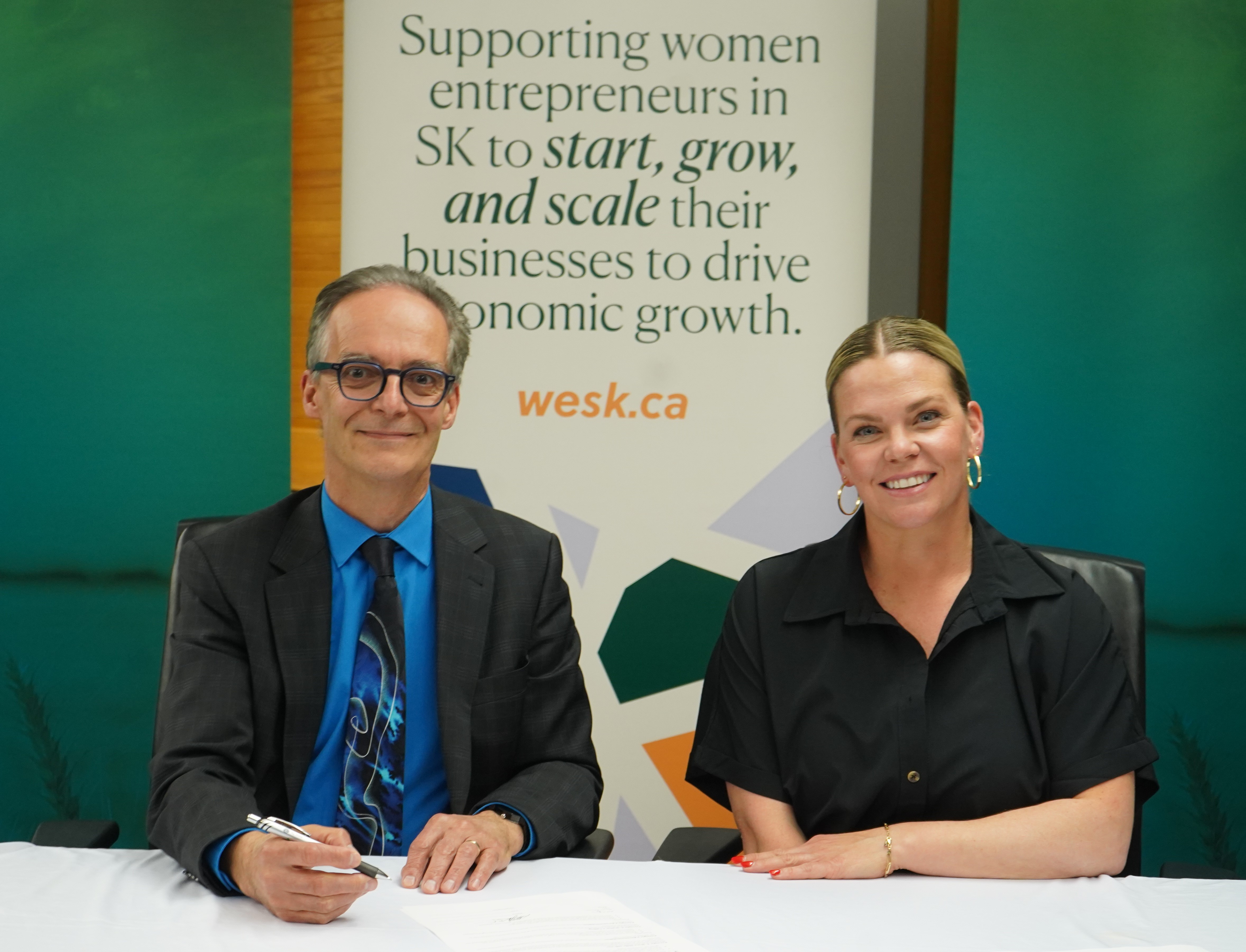 Mark Guillet and Miriam Johnson at SaskEnergy's WESK Charter signing.