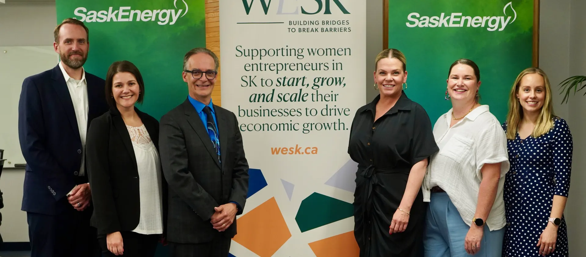 Representatives from SaskEnergy and WESK at the Charter signing.