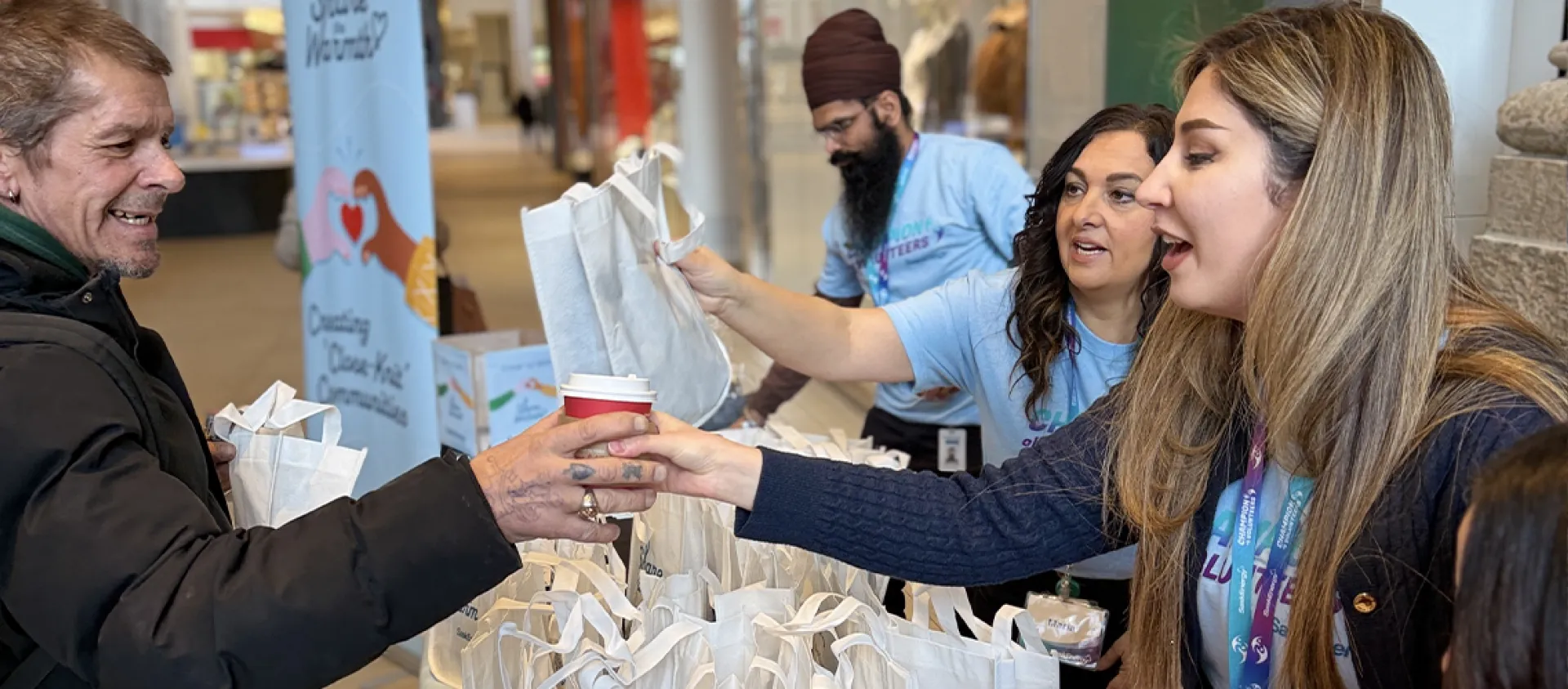 Employee handing out coffee