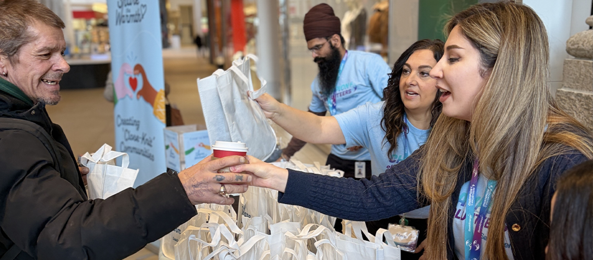 Employee handing out coffee