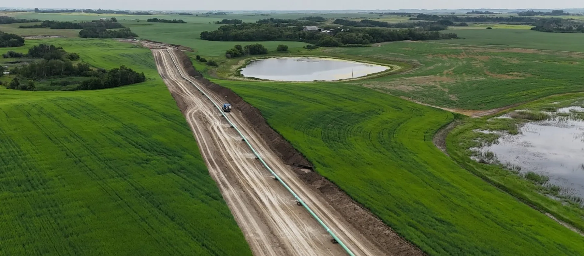 SaskEnergy gas line construction through a field.