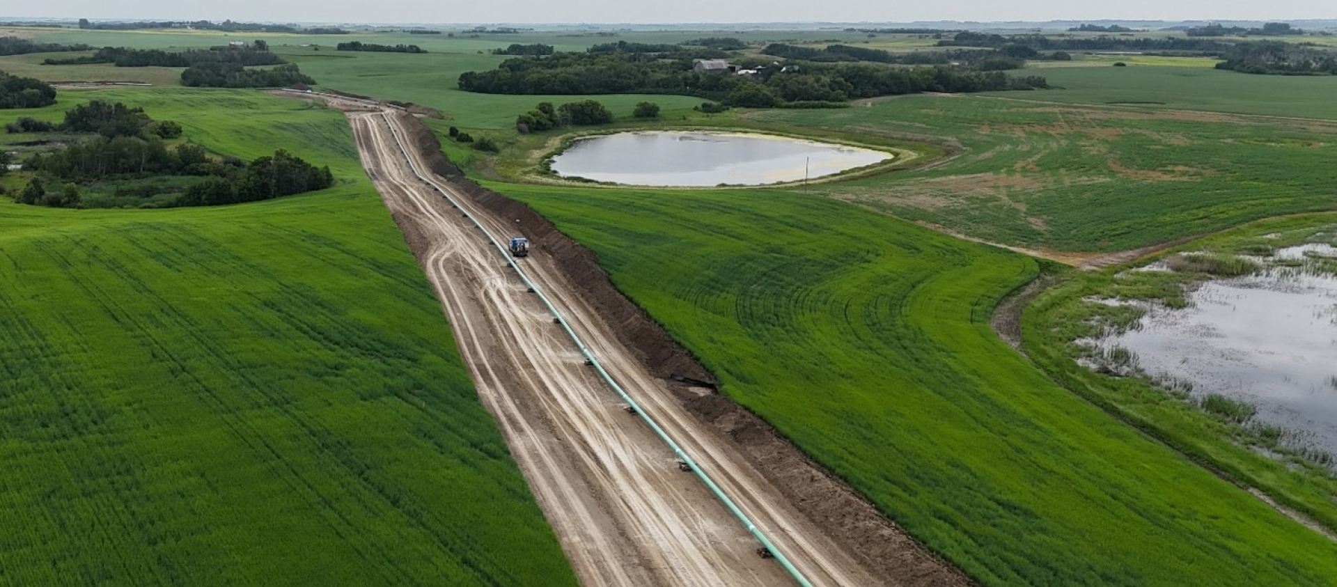 SaskEnergy gas line construction through a field.