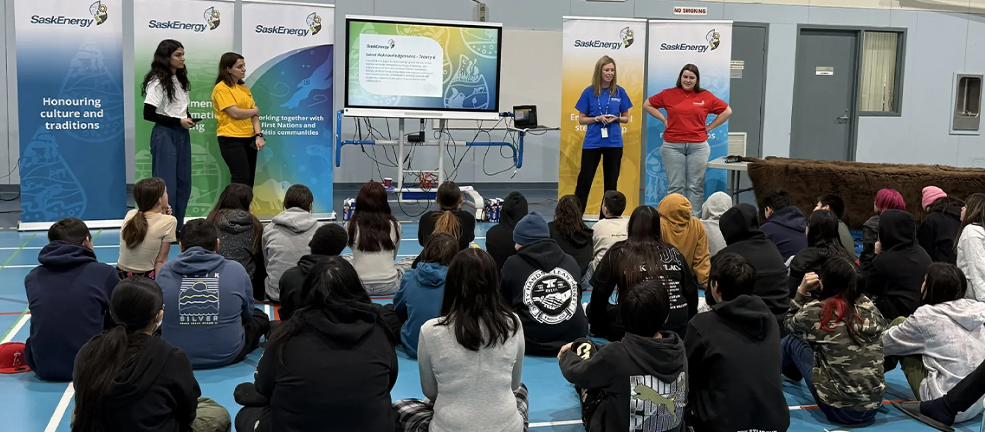 Employees presenting to students