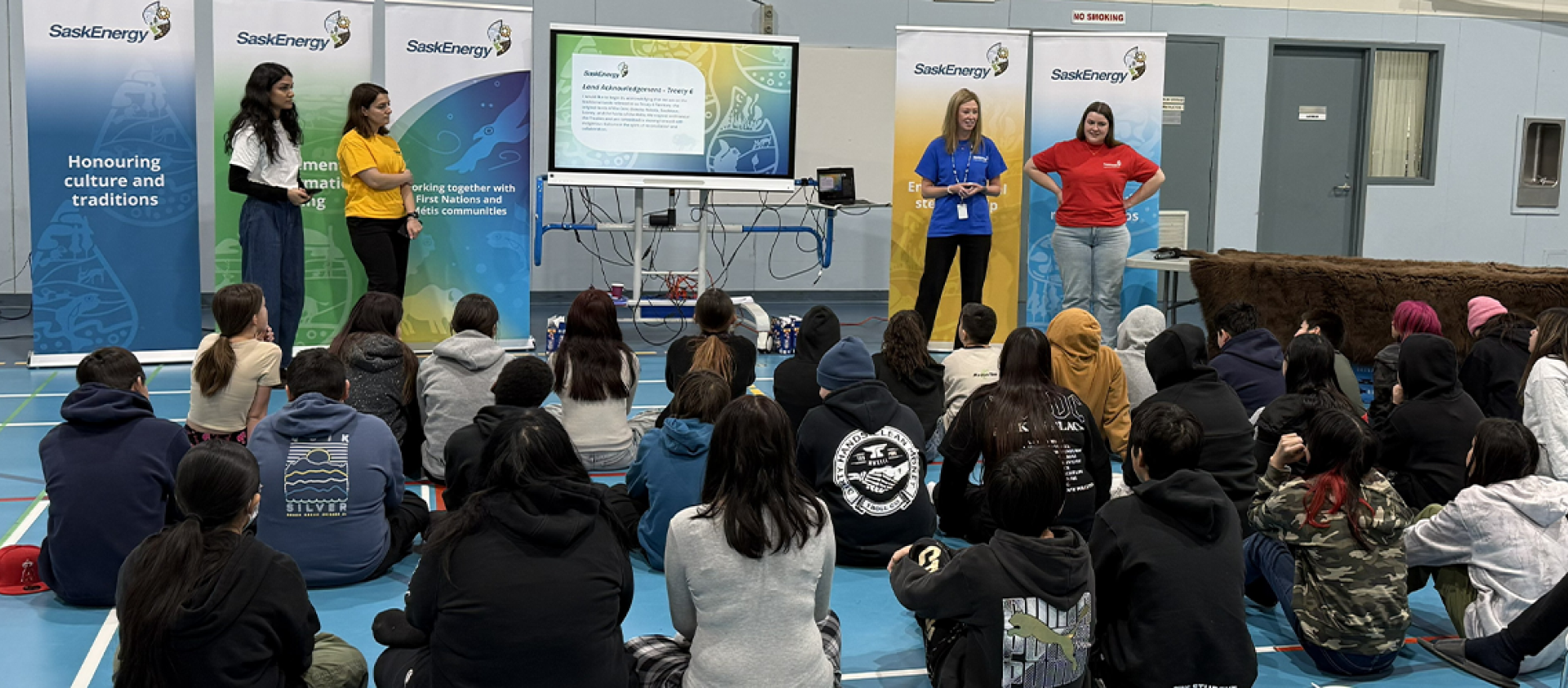 Employees presenting to students