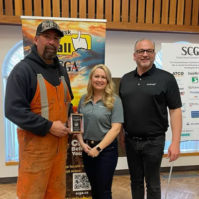 One of the award winners with SaskEnergy representatives.