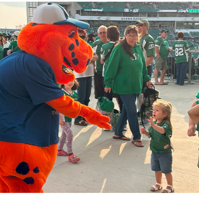 Mascot greeting child