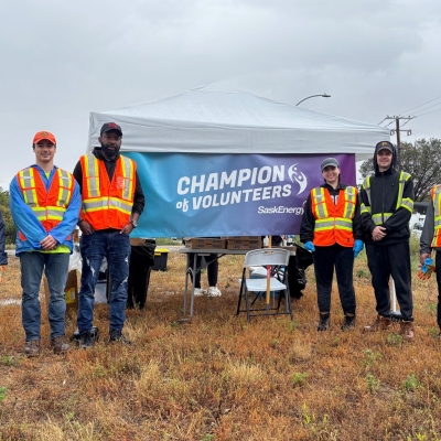 People posing for a photo in high-viz gear