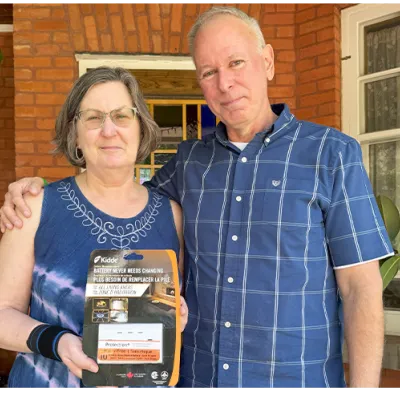 Linda and Jim Dickenson outside their home.