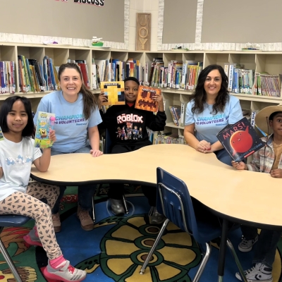 People smiling in a library