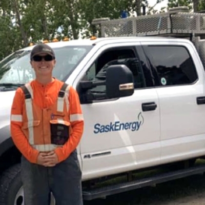Lucas Sabit on the job as an Equipment Operator for SaskEnergy.