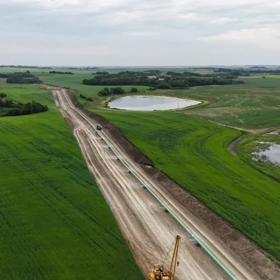 SaskEnergy gas line construction through a field.