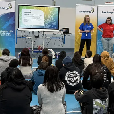 Employees presenting to students