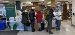 People hand out gift bags