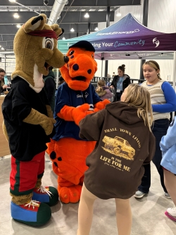 Mascots interacting with kids