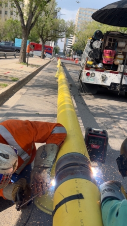 SaskEnergy Pipeline Welders work on a project in Downtown Regina