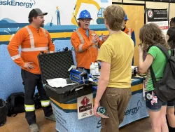 Employees speaking with students