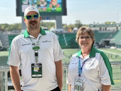 Rider Squad volunteers smiling at Mosaic Stadium