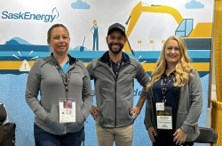 Two women and a man pose for a photo, members of SaskEnergy's Damage Prevention team.