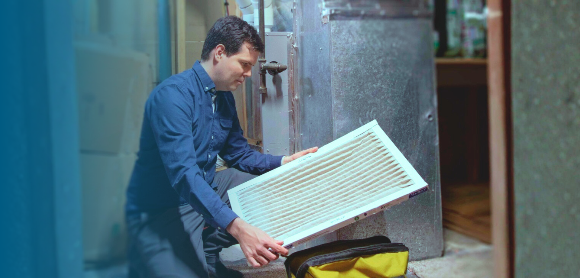 Contractor changing furnace filter