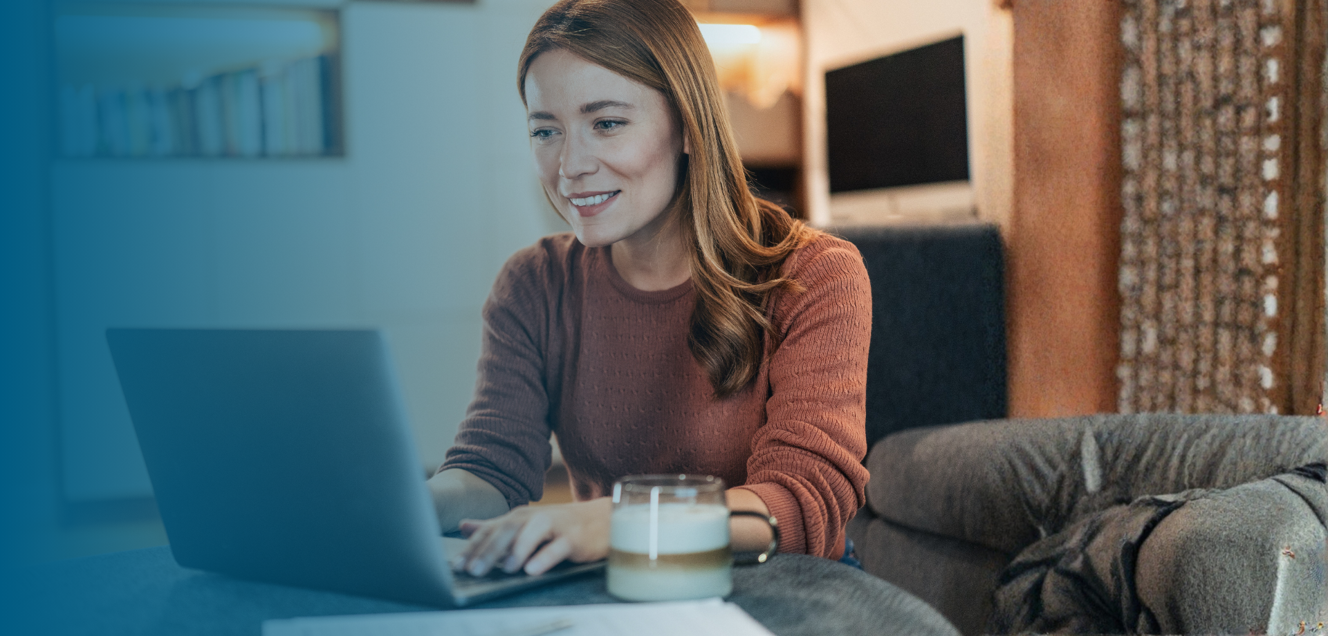 women on laptop looking at the screen